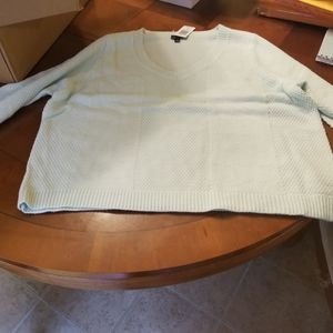 Light blue sweater. New. Size 2.